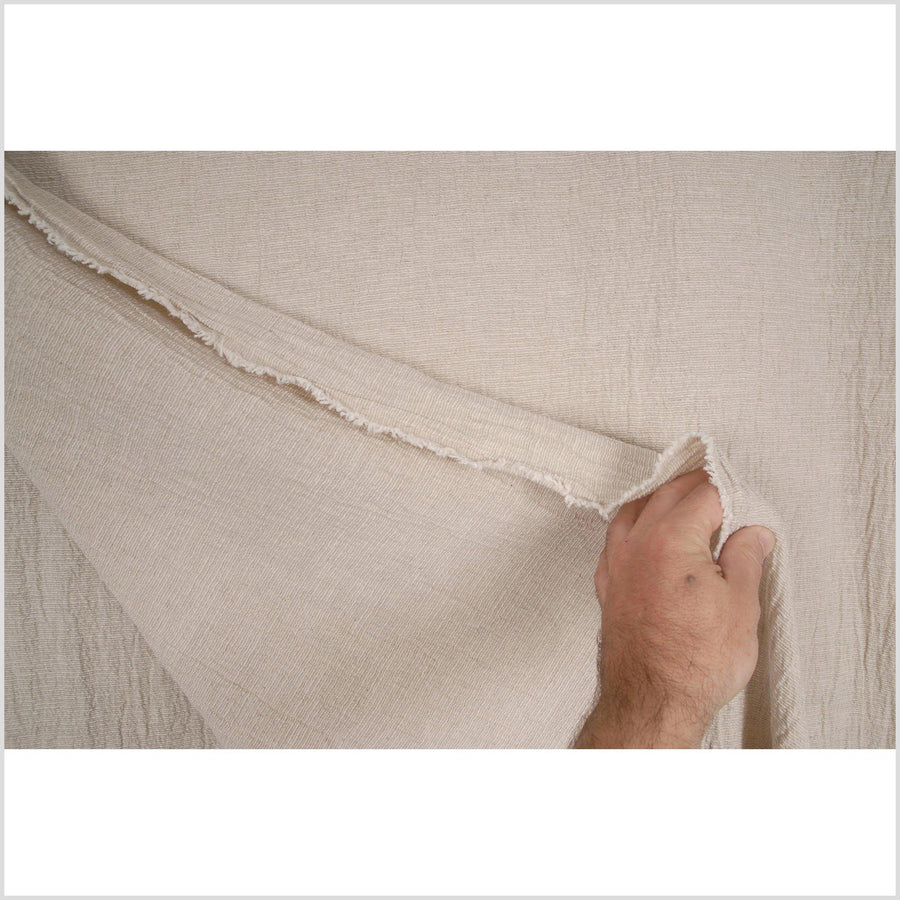 Natural, unbleached, neutral hemp and linen fabric. Beige color with a ribbed, ridged texture PHA21